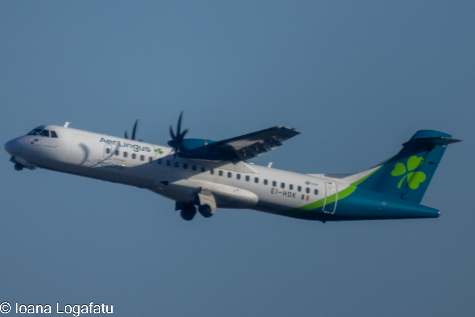 Aer Lingus aircraft ascends into the blue sky